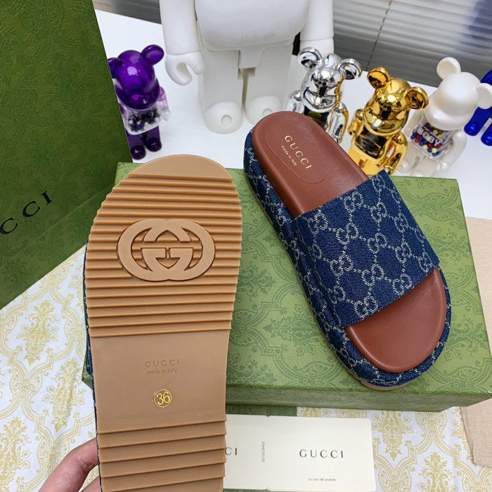 G*u*i slippers